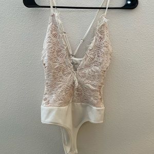 White lace cross back spaghetti strap bodysuit